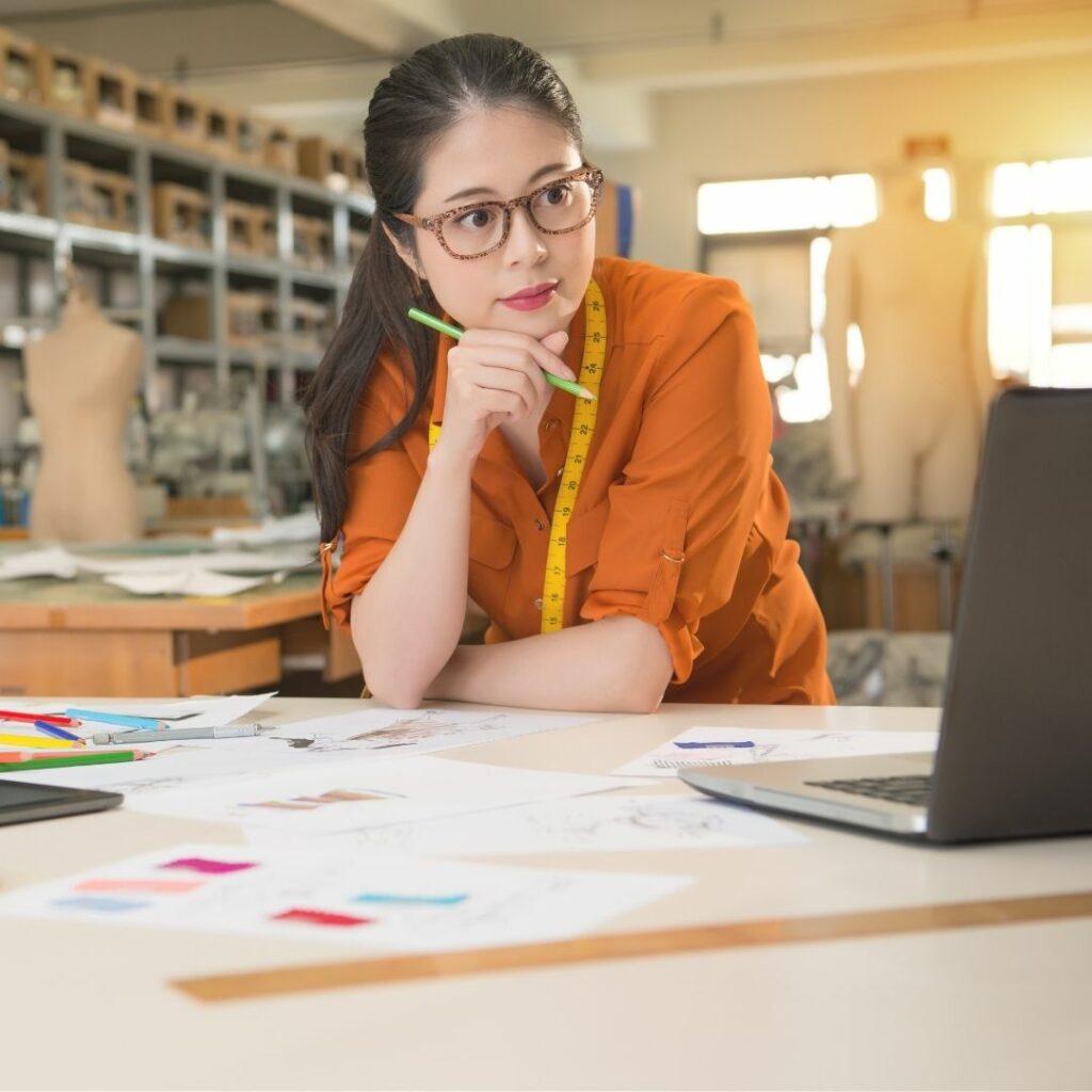 woman looking at laptop