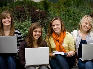 Image of girls on their computers