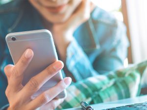 woman looking at phone