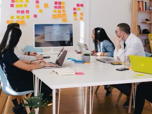 team of marketers watching a screen