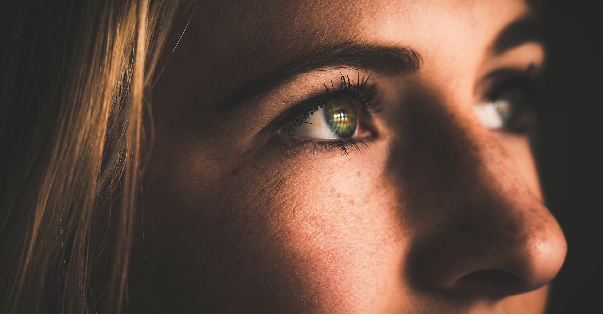 woman looking into the light